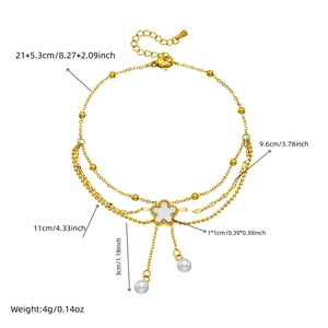 Layered gold anklet with white flower and pearl pendant featuring detailed dimensions