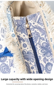 Detail of bohemian tote bag with blue pattern, gold zipper and large capacity opening