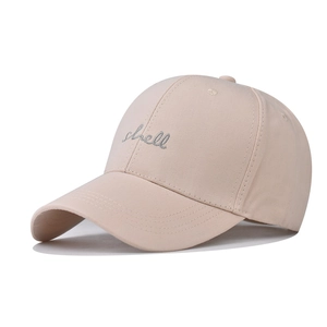 Detail of delicate shell embroidery on high-quality washed cotton baseball cap
