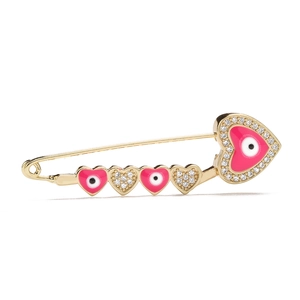 Detailed view of an 18K gold evil eye heart brooch with pink enamel and zircons