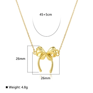 Detail of 18k gold plated bow necklace with 26mm pendant size and 45cm chain specs