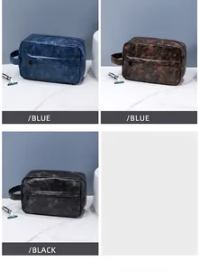 Detailed comparison of waterproof PU leather toiletry bags in blue, brown, and black colors
