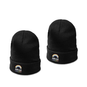Fashionable black knit beanie hat with colorful rainbow smile and heart embroidery