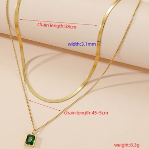 Double-layer gold stainless steel necklace with a green rectangular gemstone pendant