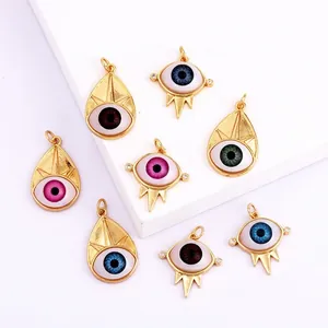 Goldene Evil Eye Anhänger mit bunten Emaille-Details und Strass für DIY-Schmuckzubehör