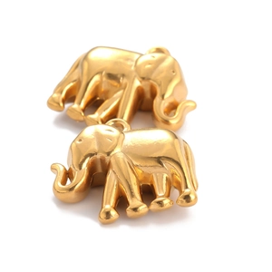 Polished 18k gold plated elephant charms in stainless steel on white background