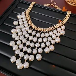 Statement necklace with multi-layer pearl tassels and gold woven chains for women
