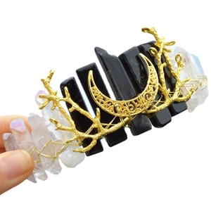 Bohemian crystal headband featuring golden moon and branch accents on a white background