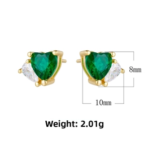 Detailed view of emerald heart-shaped silver stud earrings with drop zircon accents