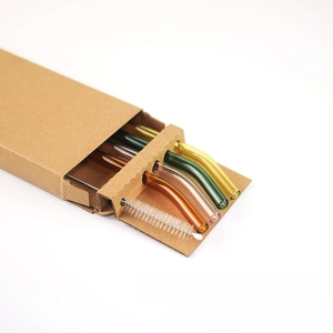 Set of four colored curved heat-resistant glass straws with cleaning brush in a box