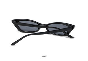 Rear view of sleek black narrow cat-eye sunglasses with polished finish on white backdrop