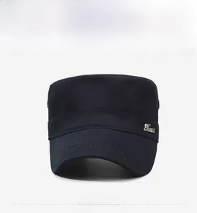 Detail of navy blue flat top cadet hat with metal Jeans badge and premium stitching