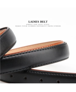 Macro detail of high-quality black leather belt with brown lining and precision stitching