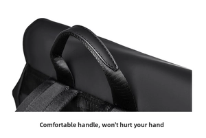 Detail of the reinforced black webbing handle on a matte waterproof laptop backpack