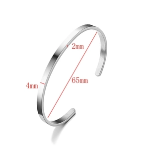 Detailed view of silver cuff bracelet showing 4mm width and 2mm thickness dimensions