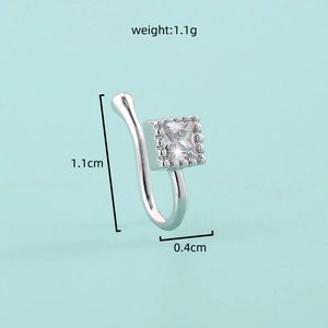 Detailed view showing the 1.1cm by 0.4cm dimensions of a silver non-piercing nose clip