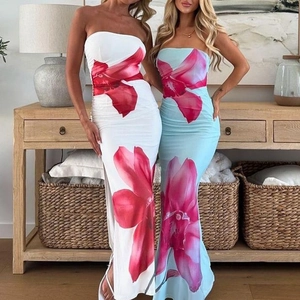 Detail of strapless slim maxi dresses with pink floral prints in white and light blue