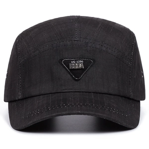 Classic black 5-panel camping cap with a metal triangular plaque and ripstop texture