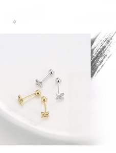Detail view of S925 sterling silver star stud earrings with zircon stones and screw ball back