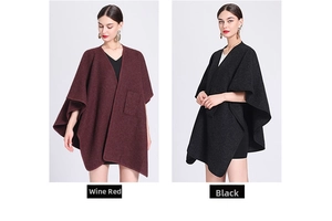 Detail view of burgundy and black knitted poncho capes showing premium fabric texture