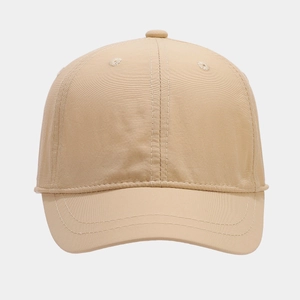 Detail shot of the breathable eyelets and premium stitching on khaki baseball cap