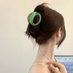 Chic Morandi green oval hair claw clip for elegant women styling and thick hair accessories