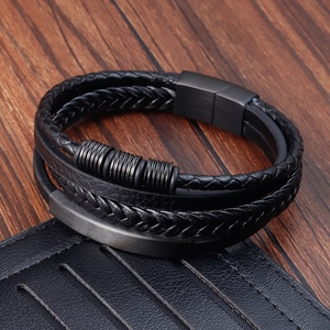 Close-up of black multilayer braided leather bracelet with stainless steel magnetic clasp