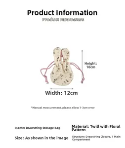 Floral drawstring bag with rabbit ears detail showing dimensions 12cm by 18cm