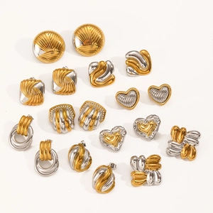 Two-tone 18k gold and silver stainless steel earrings in heart and wavy shapes