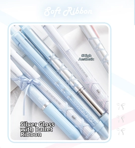Close-up of sky blue ballet-style gel pen featuring soft ribbon and heart patterns