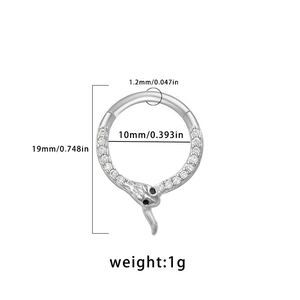 Detail showing dimensions of silver snake nose ring with black head and clear gemstone