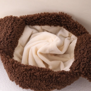 Winter bear earflap hat for kids featuring thick brown teddy fleece and warm plush lining