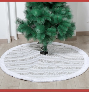 Detail of 48 inch knitted Christmas tree skirt with snowflake pattern and white faux fur trim