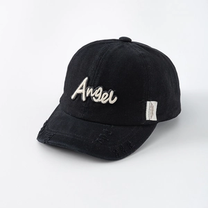 Detail of Angel script embroidery and distressed brim on washed cotton baseball cap