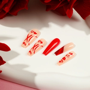 Valentine's long coffin press-on nails with red French tips, hearts, and XO patterns