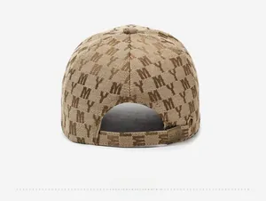 Close-up of the back of a vintage brown jacquard baseball cap with metal buckle