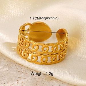 Detail view of gold geometric chain ring with heart charm and size specifications