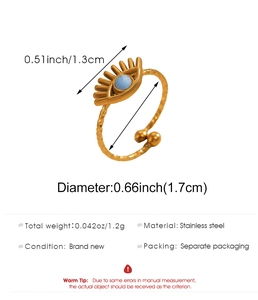 Macro detail of gold stainless steel Evil Eye ring with dimensions and weight data