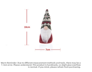 Detail of Christmas gnome figurine with snowflake hat, size marked as 18cm by 7cm
