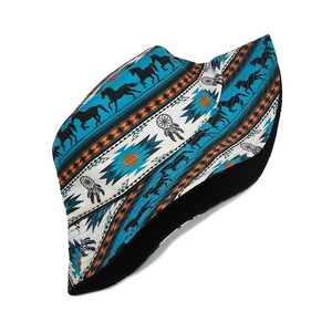 Detail of Pegasus and dreamcatcher prints on a reversible cotton sun bucket hat