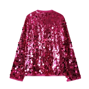Detailed view of high-density rose pink sequins on long-sleeve fashion shirt fabric