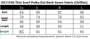Detailed size chart for polka dot halter neck top including bust and waist measurements