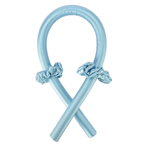 Blue silk heatless hair curler set with matching scrunchies on white background