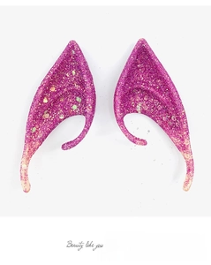 Detail view of purple glitter latex elf ears for cosplay party and Halloween accessory