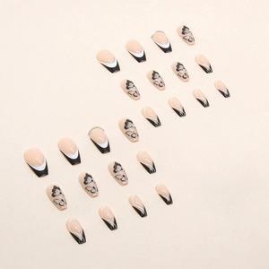 Dunkle Schmetterling-Coffin-Nägel mit schwarzen French-Tips und glitzernden Strasssteinen