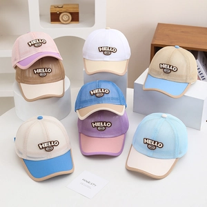 Various colors of breathable mesh baseball caps for kids with HELLO embroidery detail