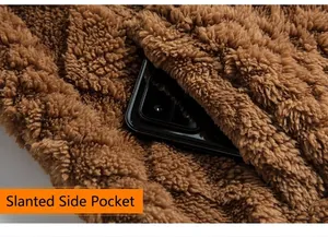 Brown fleece jacket with slanted pockets showing deep storage capacity for a smartphone