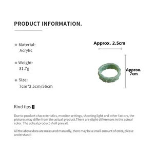 Detailed view of green acrylic triangular beads on a chunky elastic bracelet with dimensions