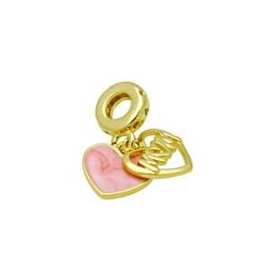Detailed macro view of pink enamel heart charm with gold Mom engraving for jewelry