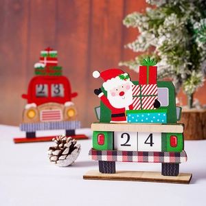 Red and green wooden Christmas countdown advent calendars in truck shape with Santa Claus